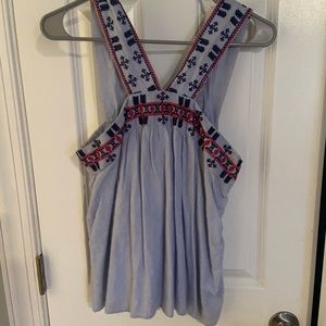 Light blue pattern blouse. Size M